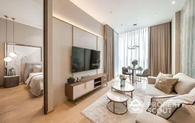 Luxurious modern living room with elegant decor and open layout, featuring a cozy dining area and large TV.