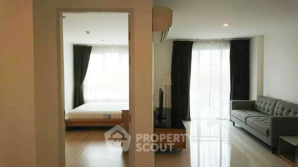 Spacious apartment with bright living room and cozy bedroom, ideal for modern living.