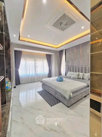 Luxurious modern bedroom with elegant decor and ambient lighting