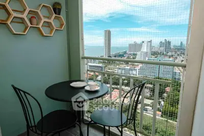 Charming balcony with stunning city and ocean view, perfect for relaxing and enjoying the skyline.