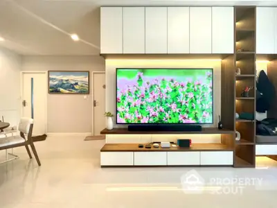 Modern living room with sleek TV unit and stylish decor