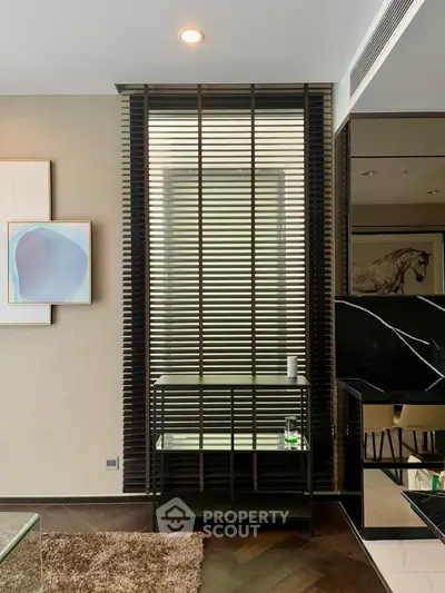 Modern living room with stylish decor and unique wall design