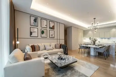 Luxurious modern living room with elegant decor and open kitchen layout