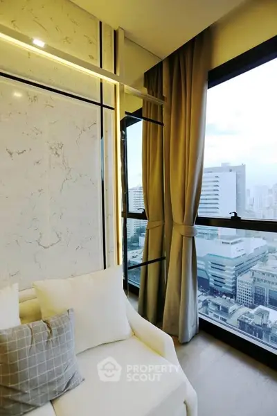 Luxurious high-rise living room with stunning city view and elegant decor