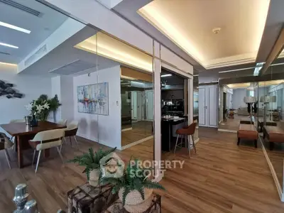 Spacious modern living room with elegant dining area and stylish decor