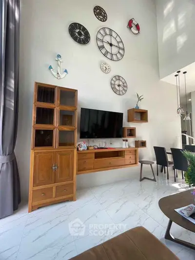 Stylish living room with nautical decor and modern wooden furniture