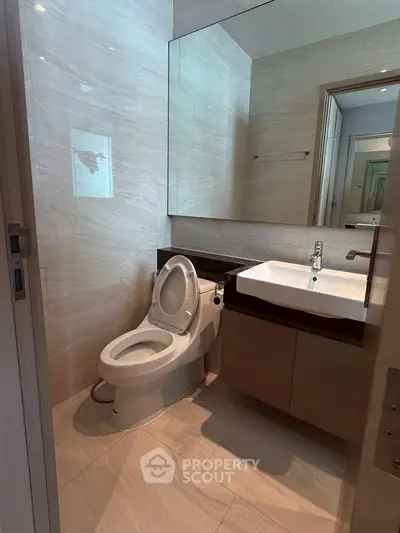 Modern bathroom with sleek fixtures and elegant tile design
