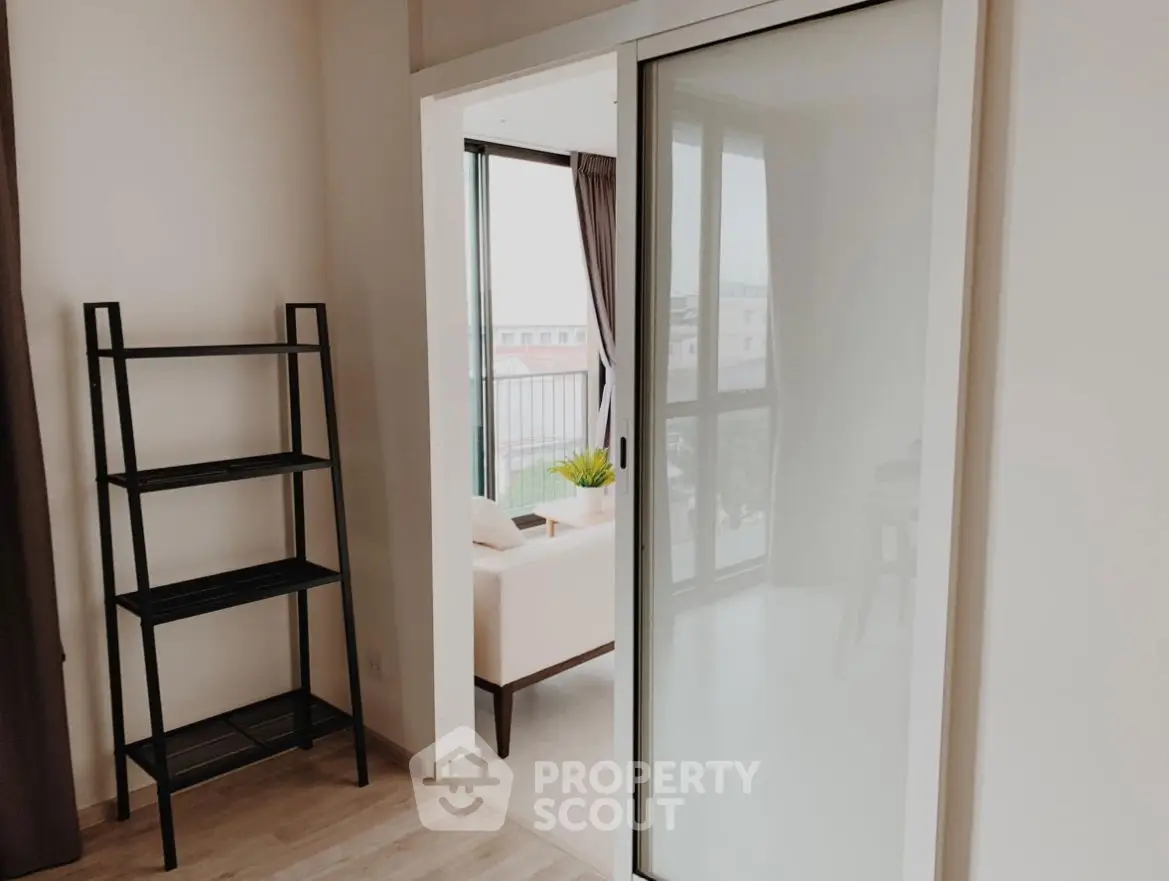 Modern apartment with sliding glass door and open living space