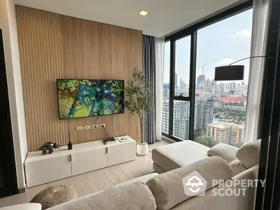 Modern living room with panoramic city view and stylish decor