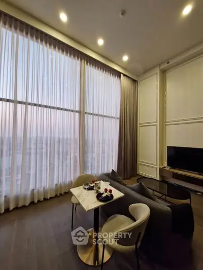 Luxurious high-rise living room with floor-to-ceiling windows and elegant decor