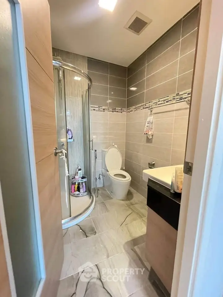 Modern bathroom with sleek shower and stylish tile design