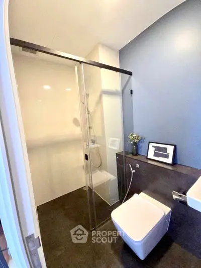 Modern bathroom with sleek shower and minimalist design