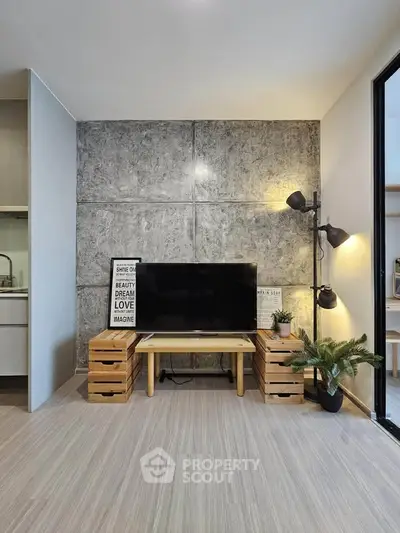 Modern living room with stylish decor and TV setup