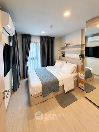 Modern bedroom with stylish decor and natural light