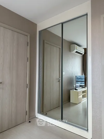 Modern interior with mirrored closet and air-conditioned living space