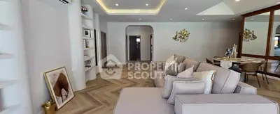 Spacious modern living room with elegant decor and cozy seating area