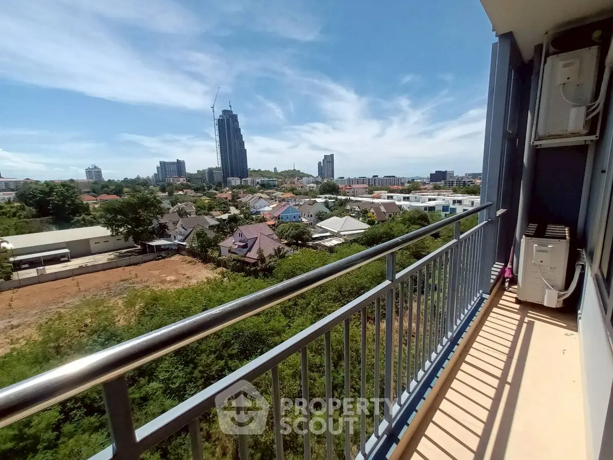Stunning cityscape view from a high-rise balcony, perfect for urban living enthusiasts.