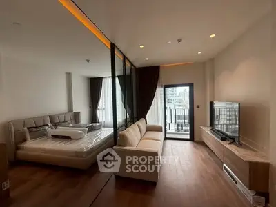 Modern studio apartment with stylish interior and city view balcony