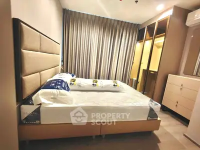 Modern bedroom with stylish furniture and ample natural light