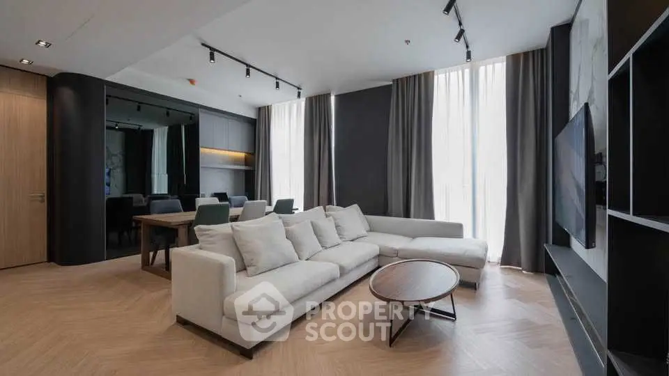Spacious modern living room with elegant decor and natural light