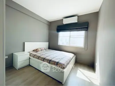 Modern bedroom with natural light and minimalist decor