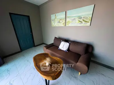 Cozy living room with modern decor and stylish wooden coffee table.
