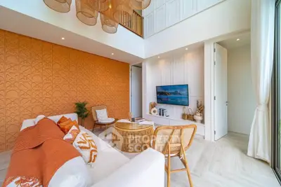 Stylish modern living room with high ceiling and vibrant orange accent wall