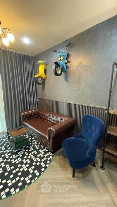 Stylish living room with leather sofa and unique wall decor featuring scooter art.