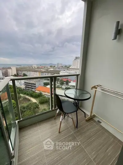 Charming balcony with stunning city view, perfect for relaxation and enjoying the skyline.