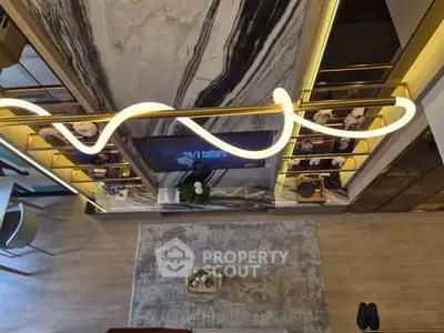 Modern living room with stylish lighting and elegant decor