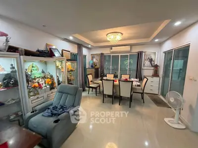 Spacious living room with elegant dining area and modern decor