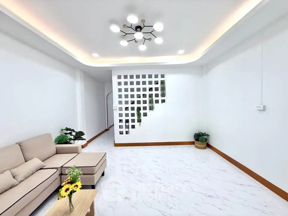 Modern living room with stylish lighting and comfortable seating