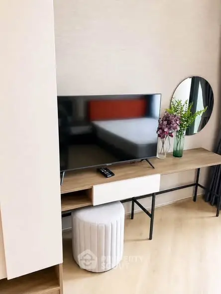 Modern living room with sleek TV setup and stylish decor