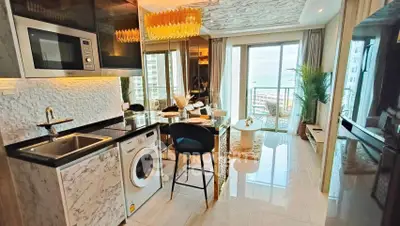 Luxurious modern kitchen with ocean view and elegant dining area