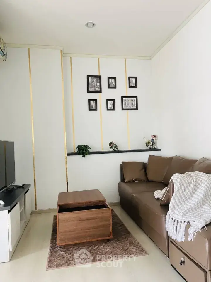 Cozy living room with modern decor and comfortable seating