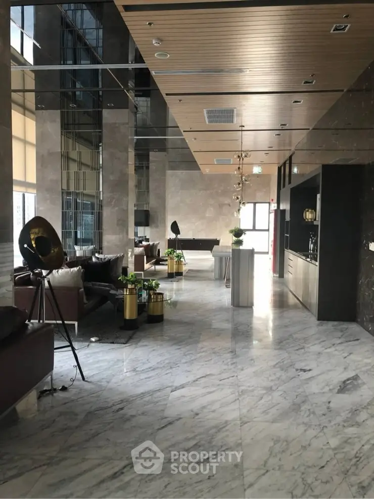 Luxurious modern lobby with marble flooring and elegant decor