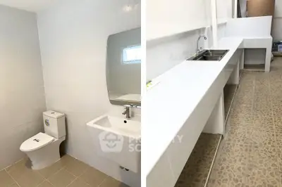 Modern bathroom and kitchen with sleek fixtures and minimalist design