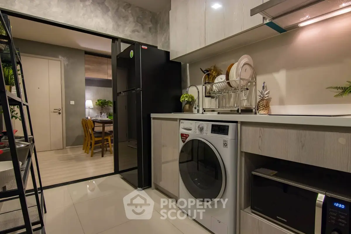 Modern kitchen with sleek appliances and open layout design