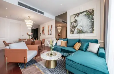 Luxurious living room with elegant decor and plush seating in a modern apartment.
