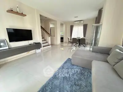 Spacious modern living room with sleek design and natural light