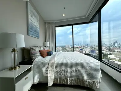 Luxurious bedroom with panoramic city view and modern decor