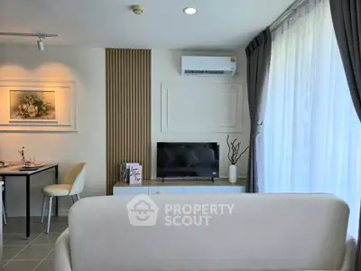 Modern living room with stylish decor and natural light