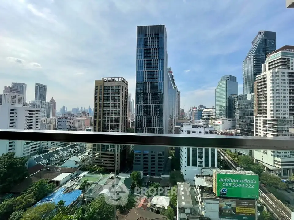 Stunning cityscape view from a high-rise balcony showcasing modern skyscrapers and urban landscape.