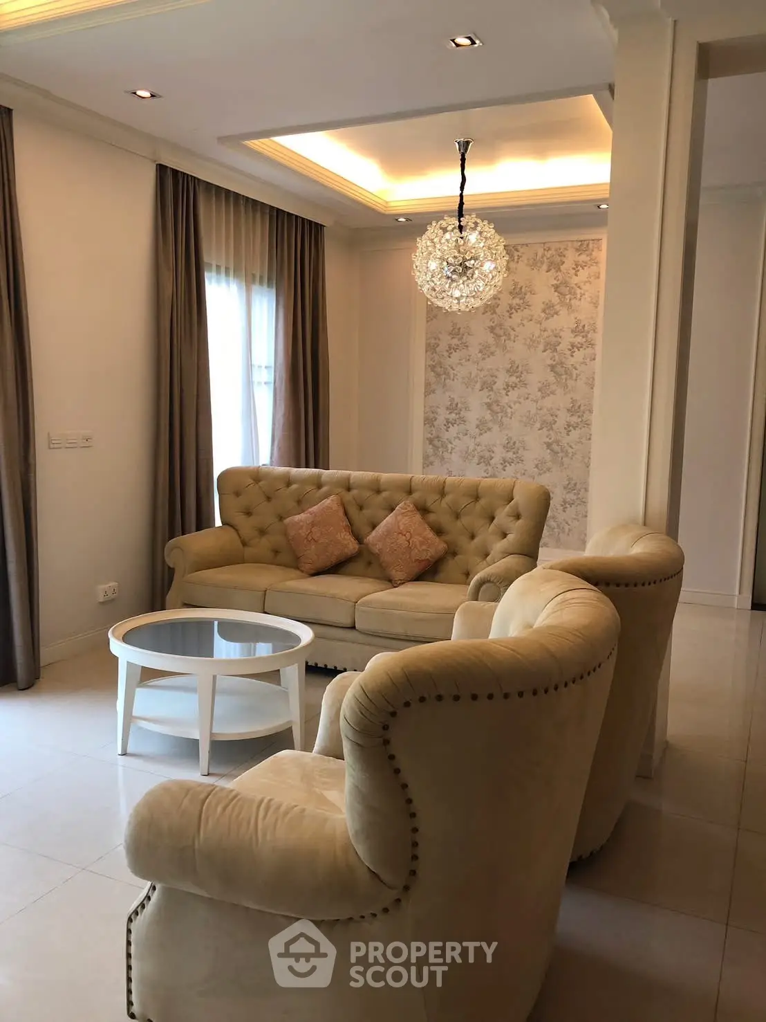 Elegant living room with plush seating and stylish lighting
