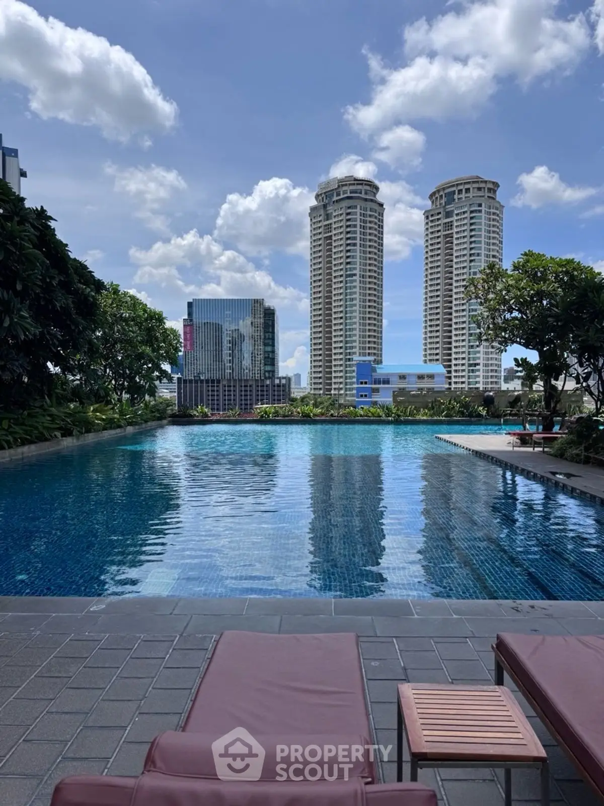 Luxurious rooftop pool with stunning city skyline view