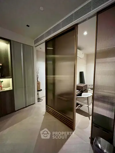 Modern interior with sliding glass doors and stylish decor in a cozy living space.