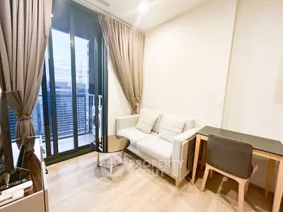 Modern living room with balcony view in high-rise apartment