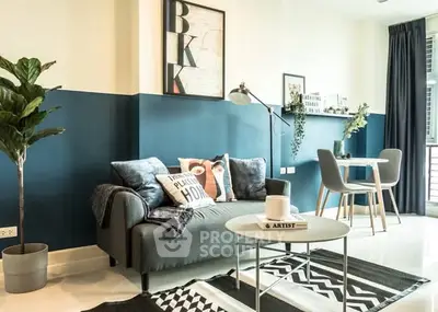 Stylish modern living room with chic decor and cozy seating area, perfect for relaxation and entertaining.