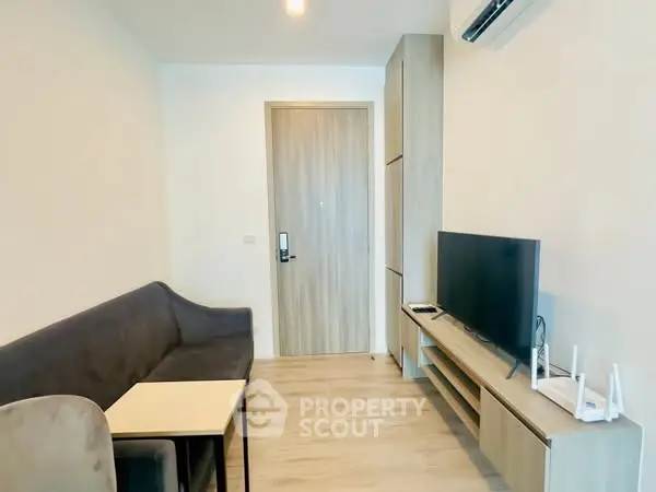 Modern living room with sleek furniture and entertainment setup