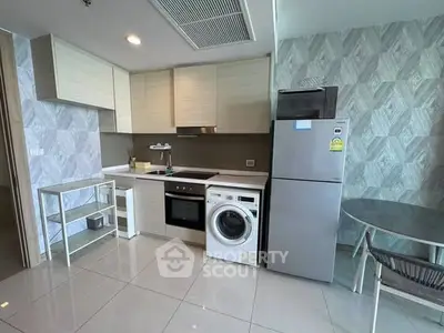 Modern kitchen with sleek appliances and stylish decor